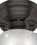 Close-up of 42 Inch Haskell Premier Bronze Low Profile Ceiling Fan With LED Light Kit And Pull Chain, marble glass cover visible.