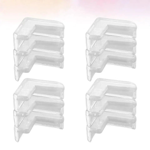White PVC Corner Protectors For Tables And Cabinets, Heavy Duty Adhesive Edge Guards, 30 Pack shown in four stacks