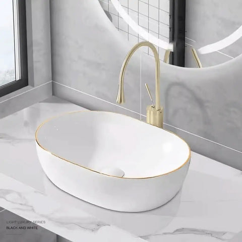 USZWBY Vessel Sinks Light Luxury Small Size Countertop Basin Household Wash Single Ceramic Gold Edge Art Bathroom Bowl Sink on marble surface.
