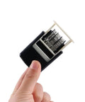 No Sweat Smooth Self Inking Date Roller Stamp With Crisp Adjust Dial Rugged Abs Alloy Frame in hand showing adjustable rollers.