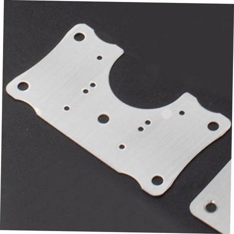 Close-up of silver plate from 5 Piece Cabinet Hinge Plates Repair Kit For Kitchen Cabinets Easy Install No Fuss Durable Design.