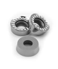 Front view: two silver aluminum R5 round turning inserts with serrated outer edge and central bore; gray spacer.