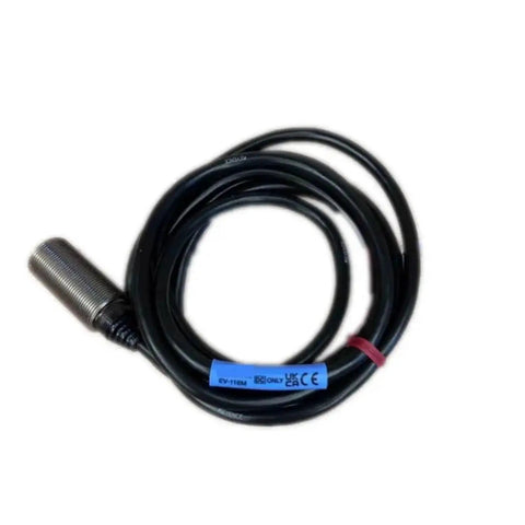 Tough As Nails Metal Proximity Switch Equipped With Long Distance Amplifier Block And Split Type Design For Stress Free Machine Mounting, featuring a metal sensor and cable.