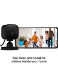 Mini Indoor Plug In Smart Security Cam With 1080P HD Video Night Vision Motion Detection showing live video on phone