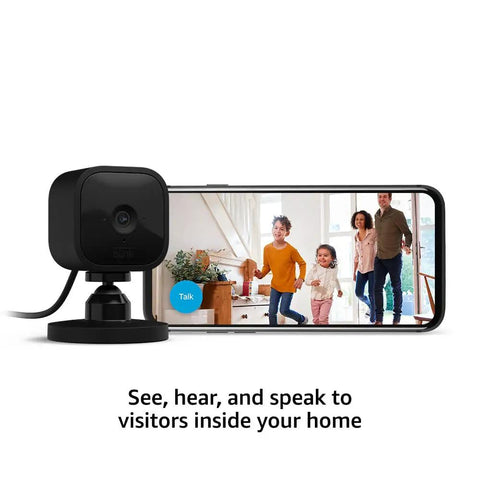 Mini Indoor Plug In Smart Security Cam With 1080P HD Video Night Vision Motion Detection showing live video on phone
