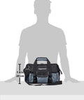 Durable Electrician Tool Bag With Strap And 50 Pockets front view, upright design, black and gray, next to silhouette for scale.
