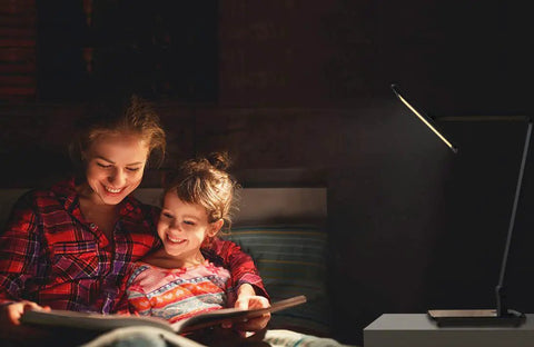 Mother and child reading under LED Desk Lamp With Large 7.4 Inch Panel Seamless Dimming Of Brightness And Color Temperature