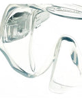 Close-up of frameless dive mask with large lenses and close fitting skirt for a comfy fit, squeeze to adjust buckles visible, clear lens medium
