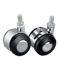 Rock Solid Four Pack Office Chair Casters Featuring Silent Rubber Wheels And Bulletproof Zinc Alloy Bases For Butter Smooth Rolling On Hardwood And Carpet Floors Guaranteed M8 Stem Thread, close-up view of two casters.