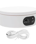 Rotatable Jewelry Display Stand With Electric Motorized Turntable Skid Base showing control panel and USB cable for powering.
