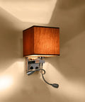 Totally Adjustable Swing Arm Wall Sconce With Soft Fabric Shade And Classic E27 Mount Smooth Painted Steel Frame mounted on wall.