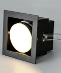 Recessed LED Ceiling Light, Downlight in black finish, showcasing round light detail, designed for flush ceiling installation.