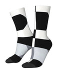 Upgrade Your Fit With Black And White Piano Grid Print Socks For Men And Women Moisture Wicking Polyester Crew Socks in a stylish grid pattern.