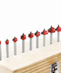 Heavy Duty Router Bit With 6mm Shank For Smooth Round Edge Cutting And Profiling Woodworking Milling Cutter Tool arranged on a wood base.