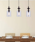 Oil Rubbed Bronze Pendant Light With Clear Glass, 3 Light Cord Pendant, Uses 100W Type A Bulbs, Adjustable Height From 27.25 Inches To 58 Inches, Sleek Modern Rustic Dining Room Kitchen Island Lighting That Feels Lit over dining table