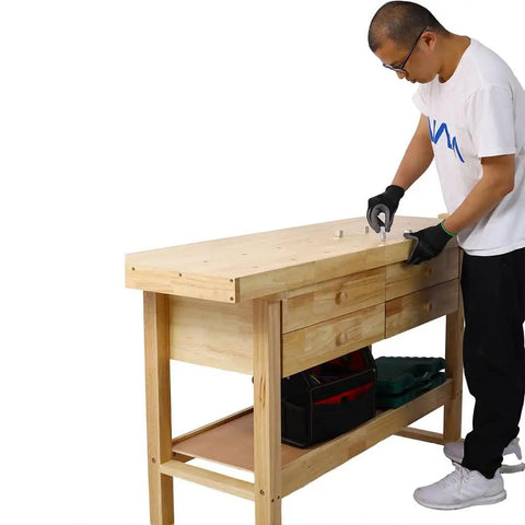 Man using 64.5 Inch Heavy Duty Rubber Wood Workbench With 4 Storage Drawers Adjustable Vise Solid Wood Work Table in garage shop