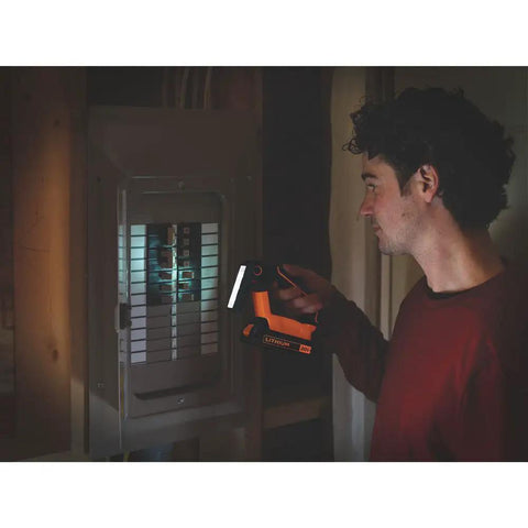 Man using 20V Max LED Work Light For Grab And Go Garage Or Jobsite Lighting With Up To 70 Lumens And Up To 11 Hours Of Runtime Articulating Head
