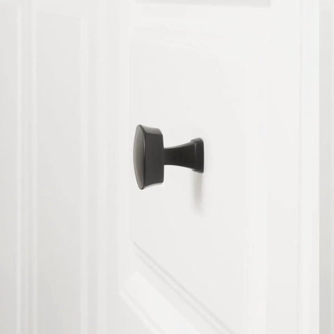 Flat Black Rounded Square Cabinet Knob Set No Brainer Install, 1.26 Inch Diameter, 1.29 Inch Projection on white cabinet.