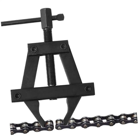 Heavy Duty Dirtbike Chain Tensioner And Motorcycle Chain Adjuster Hand Tool crafted from tough steel, shown with chain links.