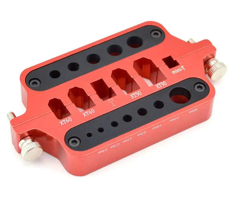 Slick Aluminum Soldering Heat Sink Pad For RC Drone Builds And Tough Multi Function XT60 XT90 T Connector Insulation Welding Jig Plate With Lightweight CNC Precision Cut Design For Quick Easy Setup, red with black accents.