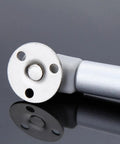 Top Shelf Kitchen Cabinet Door Gas Struts Featuring Buttery Smooth Pneumatic Lift Support For Wood Furniture Hardware, silver finish close-up.