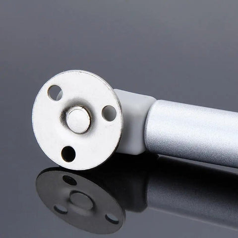 Top Shelf Kitchen Cabinet Door Gas Struts Featuring Buttery Smooth Pneumatic Lift Support For Wood Furniture Hardware, silver finish close-up.