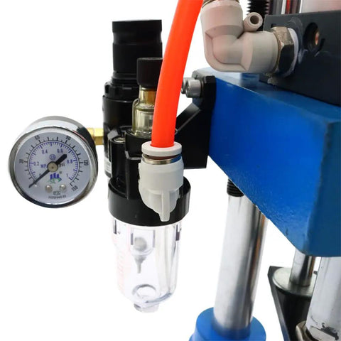 Smooth Operator Pneumatic Punch Press With Adjustable Cylinder Stroke For Kickin Sheet Metal Holes 660 Lb Pressure Two Button Control For Dead On Accuracy At 110V air pressure regulator and gauge close-up.