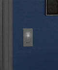 Decora LED Illuminated 15 Amp Single-Pole Wall Switch, No Neutral Required, White, Illuminated When OFF on blue wall