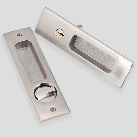 Privacy Pocket Door Lock Hardware With Key For Invisible Barn Doors In Brushed Nickel Finish Indoor Privacy Furniture Lock Set 1 Pack Built Tough Easy To Install, shown uninstalled with key slot and turn lock in brushed nickel.