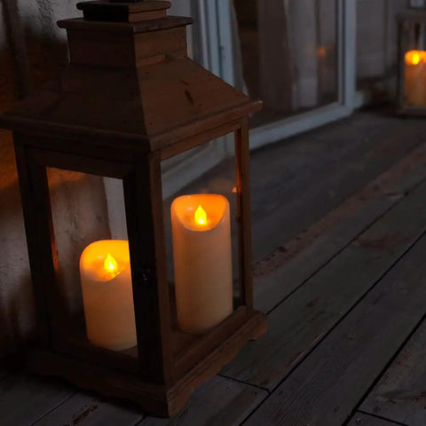 Outdoor Waterproof Flameless Candles With Timers And Remote Control For Porch And Patio Vibe No Mess Cleanup Realistic Wax Look Battery Operated LED Plastic Ivory Candles 3 By 7 Inch Set Of 3 inside lantern at night