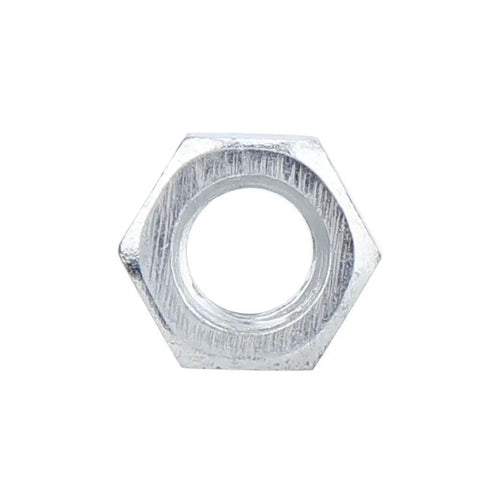 Close-up of a metal hex nut with textured edges and smooth surface.
