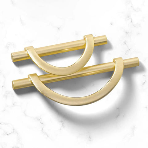 Brushed Gold Half Moon Cabinet Pulls Set of 2, 3.75 Inch Length, zinc alloy handles on a marble surface