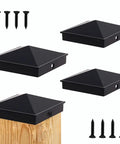 Rock Solid 4x4 Aluminum Post Caps Matte Black Pyramid Fence Covers on wood post with screws for secure installation.