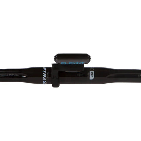 Handlebar Mount For Wahoo Elemnt Roam Bolt Mini And Elemnt Devices, Quick Hinged Installation With Spacer Kit For 22.2mm And 25.4mm Bars, No Fuss Lock, Durable Aluminum Mount For A Smooth Ride On Any Trek installed on a black handlebar from above.