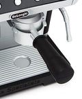 Close-up of Casdon De'Longhi toy espresso machine with black portafilter handle and silver body.