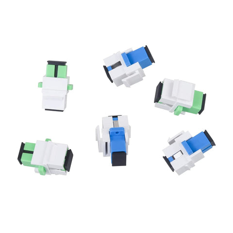 Ten Pack Fiber Optic SC To SC APC Simplex Couplers For Singlemode Cables with white keystone jack adapters on white surface