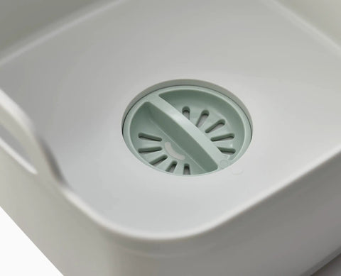 Close-up of Wash And Drain Kitchen Dish Tub With Handles And Twist Drain Plug 9 Liter Basin, showing built-in strainer and plug
