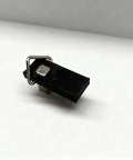 Magnetic hold-down clamp for honeycomb work tables; black rectangular body with metal ring and magnet plate.