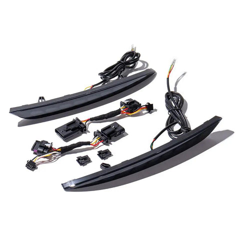 Slick Sequential Rear Bumper Lights For Tesla Model 3 with dark smoke lens and wiring harness included.