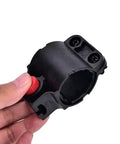 Hand holding a black plastic Two Pack Bike Lock Mounting Bracket Holder Frame Mount Replacement Storage Clamp