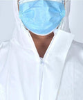 Close-up of Six Pack Disposable Protective Coveralls For Painting And Work White Lightweight SMS Material in white, zip detail