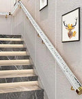 Clear Acrylic Stair Rail With Elegant Gold Brackets Adjustable Handrail Kit For Indoor Outdoor Rooms Slick Look Top Shelf Home Flex Easy Install Four Point Five Feet installed on a modern staircase with wall art.
