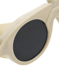 Close-up of Tough As Nails Welding Safety Glasses With Anti Fog Lenses against bright background, showcasing tinted lenses and durable frame.