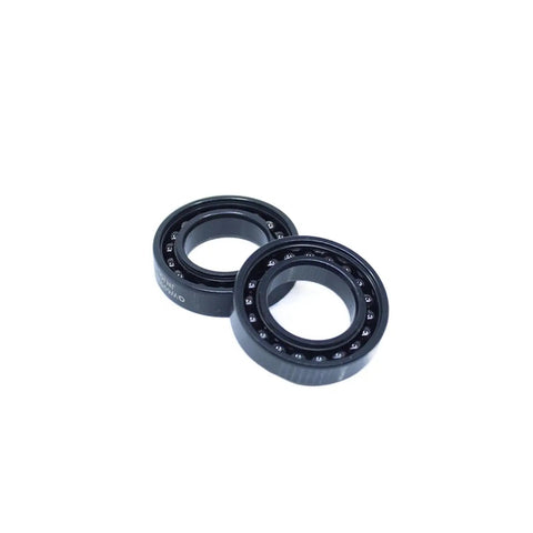 Heavy Duty High Temperature Ball Bearings With Rock Solid Cast Iron Housings Rated For 500 Degrees Celsius, black two-piece setup.