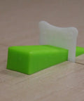 Tile Leveling Clips One Sixteenth Inch Five Hundred Piece Set For Flawless Floor And Wall Tiling Interlocking System Prevents Lippage While Adhesive Dries Easy Install Durable Construction Keeps Tiles Aligned showing clip inserted between tiles.