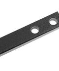 Close-up of a steel bar with two holes, part of a Heavy Duty Manual Rebar Bender Tool for metal fabrication projects.