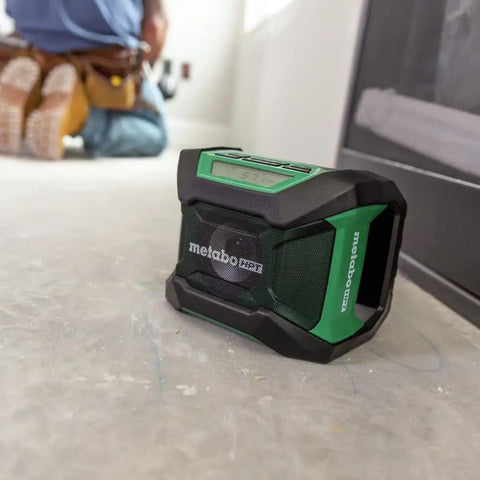 18V MultiVolt Cordless Bluetooth Radio With 15 Level Bass And Treble Equalizer on construction site floor