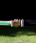 Solid Brass Garden Hose Repair Kit with Stainless Steel Clamps, hose connection outdoors showing fittings and clamps in focus.