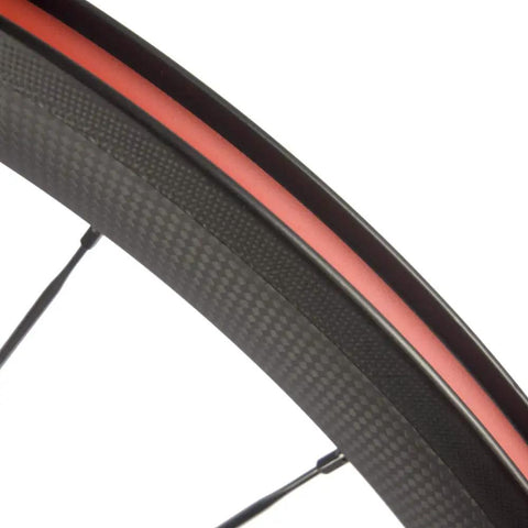 Close-up of 38 And 25mm Carbon Wheelset For 700c Clincher With Basalt Braking Surface, Toray T700 Carbon Fiber, detailed rim view