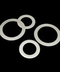 Ultra Thin Flat Washers Set 0.1 0.2 0.3mm M3 M4 M5 M6 M8 304 Stainless Steel Shim Kit With Box, 500 Or 1200 Pieces, Pro Grade Precision Spacers For Precise Fit And Easy Sorting. 304 stainless steel flat washers on black background
